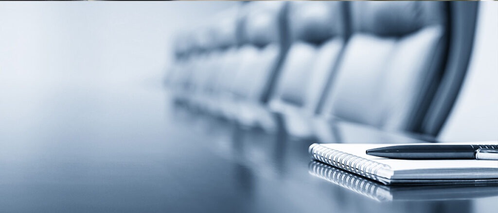 Notepad on a table with pen before meeting, blue tone, business concept with copy space