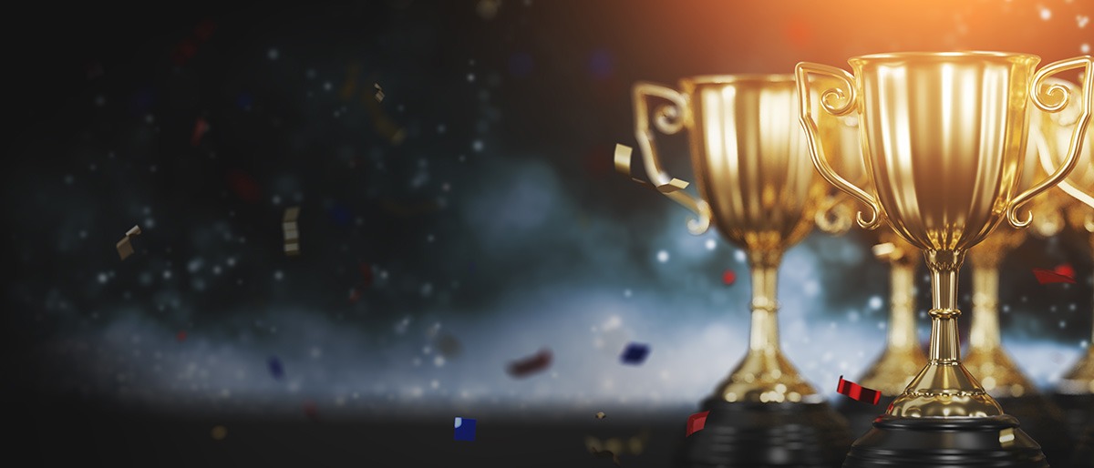 close up golden trophy award with falling confetti. copy space for text. 3d rendering.